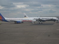 G-GDFZ @ EGNX - G-GDFZ sharing the apron at East Midlands with a Monarch A321 - by Adam Loader
