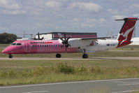 VH-QOH @ YBBN - QOH taxing for departure to Mohranbah - by V8Bathurst888