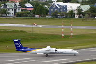 TF-FXB @ BIRK - The chairman of Icelandic Planespotter Association (IPA) is reported to live in that beautiful blue house next to airport fence... - by Holger Zengler