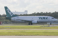 ZK-TLD @ YBBN - TLD departing for its freight service to Port Moresby - by V8Bathurst888