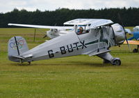 G-BUTX @ EGLM - Bucker BU-133C Jungmeister at White Waltham in new scheme. Shame the Swastika has been removed. - by moxy