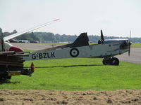 G-BZLK @ EGHL - at lasham - thought it was an old biplane at first! - by magnaman