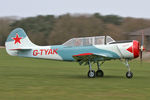 G-TYAK @ EGBR - Bacau Yak-52 at Breighton Airfield in March 2011. - by Malcolm Clarke