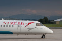 OE-LGC @ LOWL - LGC parked with a view to the alps - by Peter Pabel