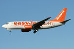 G-EZKC @ EGNT - Boeing 737-73V on approach to 25 at Newcastle Airport, November 2nd 2006. - by Malcolm Clarke