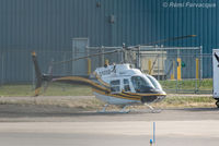 C-GYHL @ CYXS - Parked south of main terminal - by Remi Farvacque