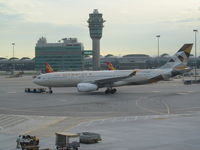 A6-EYK @ VHHH - being towed at HKG - by magnaman