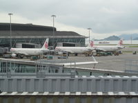 B-HTI @ VHHH - with two colleagues at HKG - by magnaman
