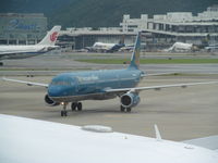 VN-A323 @ VHHH - taxying in at HKG - by magnaman