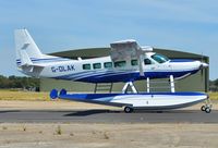 G-DLAK @ EGHH - Taxiing to depart home to Loch Lomond after repaint - by John Coates