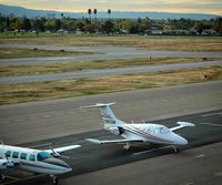 N85SM @ KRHV - Arizona based 2008 Eclipse EA500 parked on the transient ramp next to a transient Aerostar for the 2008 AOPA Fly In at Reid Hillview Airport, San Jose, CA. - by Chris Leipelt