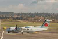 C-GSTA @ CYVR - Taxiing to domestic after eastward landing on north runway. - by Remi Farvacque