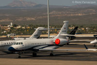 N2000L @ MMSD - New livery since last photographed, plus bulge added to top of tail. Parked north of main terminal building, private jet area. - by Remi Farvacque