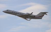 N311EL @ MIA - Gulfstream IV - by Florida Metal