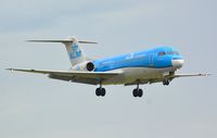 PH-KZB @ EHAM - Fokker 70 seconds from touching down at the Polderbaan - by Paul H