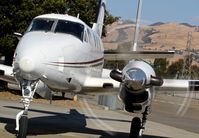 N12GJ @ KRHV - Locally-based 1972 King Air E90 taxing to the wash rack for me to wash at Reid Hillview Airport, San Jose, CA. - by Chris Leipelt