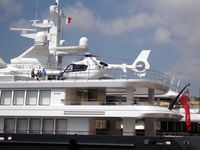 M-ARIZ - Isle of Man registered Eurocopter on deck of luxury motor yacht 'QLR' (presumed name - see picture) in Dockyard Creek, Vittoriosa, opposite Valletta, Malta. - by Neil Henry