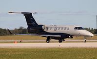 N588EE @ ORL - Phenom 300 - by Florida Metal