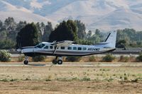 N604MD @ E16 - Quantum Spatial Inc. (Sheboygan, WI) 2004 Cessna 208B Grand Caravan departing at South County Airport, San Martin, CA. Not sure why it was here but it's a rare visitor and was departing to KPRB. - by Chris Leipelt