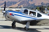 N80737 @ E16 - KHAF based 1946 Globe Swift taxing in and kicking up some dirt on me at South County Airport, San Martin, CA. - by Chris Leipelt