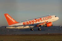 G-EZAT @ EGGW - G EZAT A319-111 Early morning takeoff from Luton heading to FCO. - by dave226688