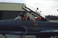 133315 @ ETNJ - Pilots strapping in their CT-133 prior to a mission from Jever Air Base, Germany - by Van Propeller