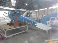 G-ABWP @ EGKR - through hangar window - only found out after you can go in hangar if you use café toilet!!! - by magnaman