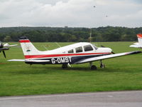 G-OMST @ EGKR - on grass at redhill - by magnaman