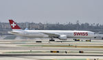 HB-JNC @ KLAX - Taxiing at LAX - by Todd Royer