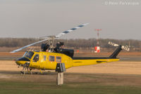 C-FJUU @ CYXJ - Maintenance in progress. Parked opposite main terminal. - by Remi Farvacque