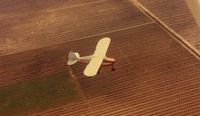 N2371P - 71P seen flying over central California farmland, most likely grapevines.