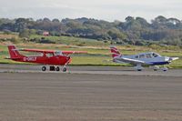 G-OKLY @ EGFH - G-OKLY parked up and G-EGBJ shutting down. - by Derek Flewin