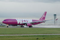 EC-MIO @ EHAM - WOW Air Airbus A330-343 taking off from a wet runway at Schiphol airport, the Netherlands - by Van Propeller