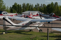 C-FQRX @ CYYE - Parked in private hangar area.