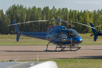 C-FSPR @ CYYE - Parked in front of Qwest Helicopters hangar.