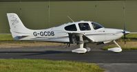 G-GCDB @ EGHH - Taxiing to depart - by John Coates