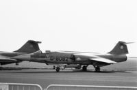 D-8082 @ EHDP - Lockheed F-104G Starfighter of the Royal Netherlands Air Force 322 squadron at De Peel air base, 1980. Note two Sidewinder missiles under the fuselage. - by Van Propeller