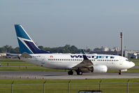 C-FWSK @ CYUL - Boeing 737-7CT [36420] (Westjet) Montreal-Dorval Int'l~C 07/06/2012 - by Ray Barber