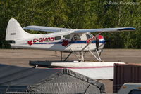 C-GMGD @ CYYE - Parked in front of private hanger, NE part of airport. - by Remi Farvacque