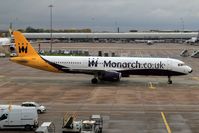 G-OZBE @ EGCC - Minute before docking at Manchester airport, gate 10. - by ikeharel