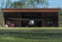 C-FFAD @ CYYD - In private hangar. Head-on shot. - by Remi Farvacque