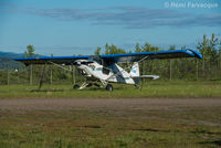 C-FJSX @ CYYD - Parked in east portion of airport with other private craft. - by Remi Farvacque