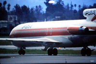 N555PS @ KSJC - Early 1980s shot at San Jose, CA Boeing 727 rolling to 30L for departure