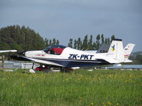 ZK-PKT @ NZAR - on grass at AMZ - by magnaman