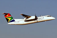 ZS-NMA @ FAJS - De Havilland Canada DHC-8-311 Dash 8 [358] (South African Express) Johannesburg Int~ZS 19/09/2006. Taken through the glass of the terminal. - by Ray Barber