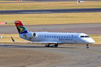ZS-NMI @ FAJS - Canadair CRJ-200ER [7153] (South African Express) Johannesburg Int~ZS 19/09/2006. Taken through the glass of the terminal. - by Ray Barber