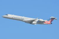 N727SK @ KLAX - American Eagle CL700 departing LAX - by FerryPNL