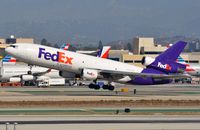 N562FE @ KLAX - Fedex MD10F taking-off. - by FerryPNL