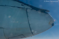 C-GUON - Detail of right wing engine nacelle and exhaust. Note wear & tear, patching around exhaust. Flight from YYD to YVR. - by Remi Farvacque