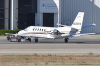 N560PA @ KVNY - Cessna 560 being prepared for its next  flight. - by FerryPNL